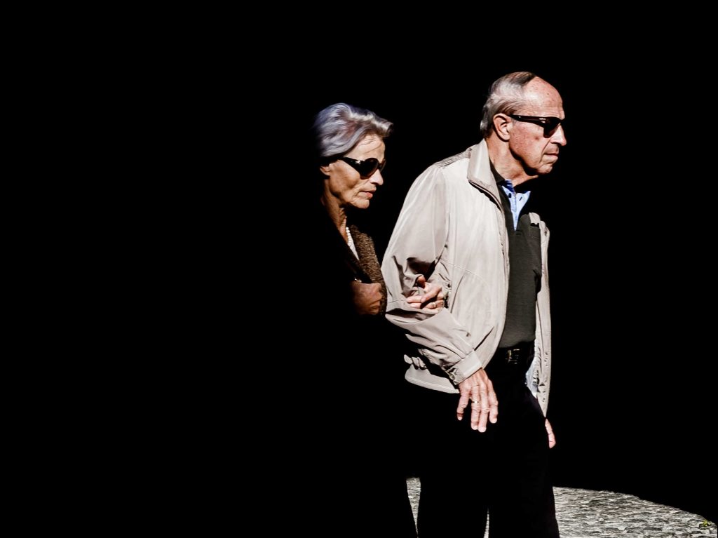 elderly couple walking